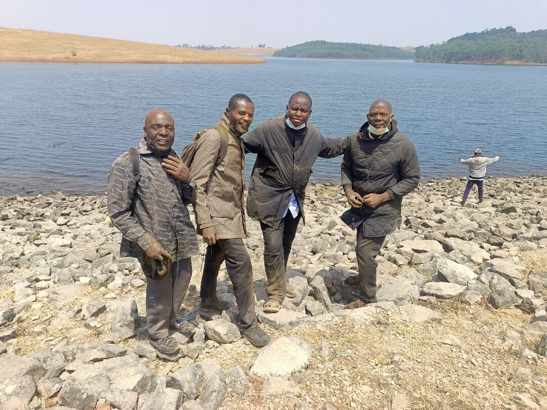 Field Survey Team led by the Global Director, standing second from the right.